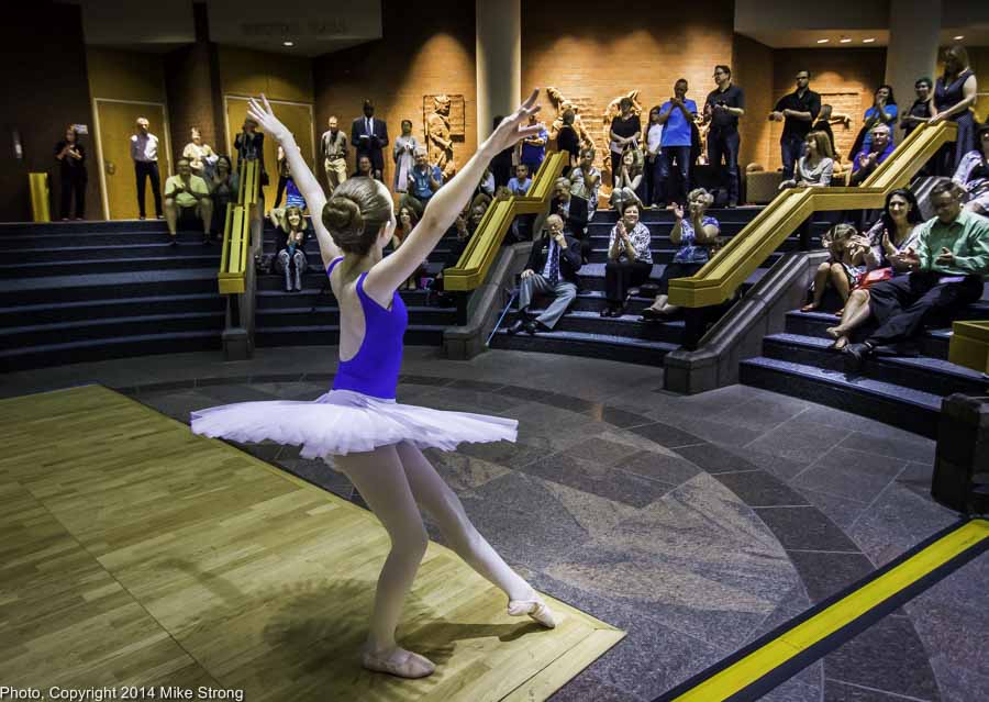 Young dancer from Crescendo Conservatory performs in lobby of the Carlsen Center