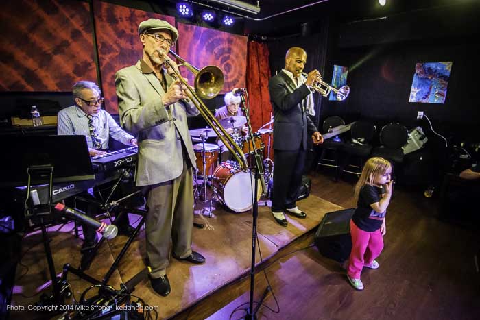 Mike Ning (Left, keyboards), Rich Hill (trombone), Victor Perlmutter (drums), Lonnie McFadden (trumpet) and Mike Ning's grandaughter