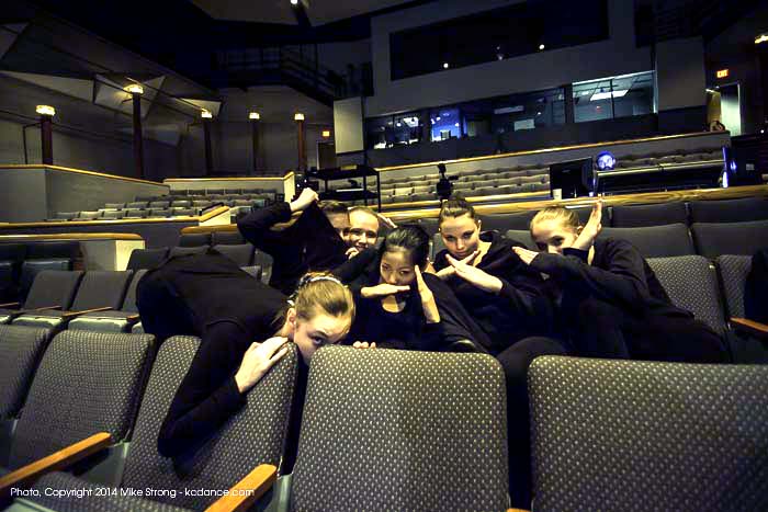The panel movers. Those four big white flats which move around the stage on rollers in back of the dancers are propelled by these members of the American Youth Ballet who are hidden behind the panels.