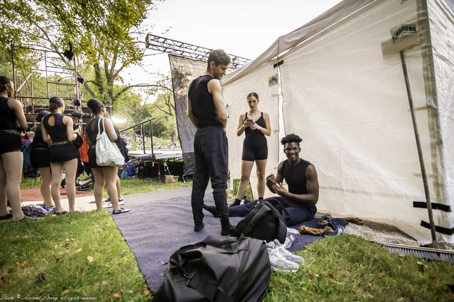 Getting ready for Wylliams-Henry at Dance in the Park 2021 with Ensuing, by DeeAnna Hiett: left to right in center: Jeremy Hanson, Ashlan Zay and John Swapshire.