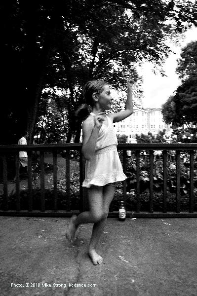 Young fan dances on the bandstand. - photo by Mike Strong kcdance.com