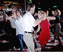 Gregg and Shawna sway during a swing dance