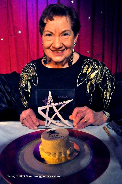 Billie Mahoney with cake and Legacy award from Dancers Over 40 - Photo Mike Strong
