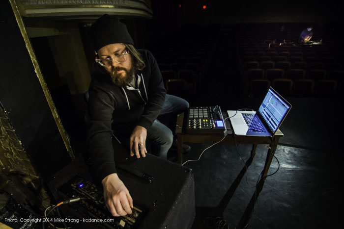 Composer Hunter Long setting up for Chadi El-Koury's piece Words in Motion (tech)